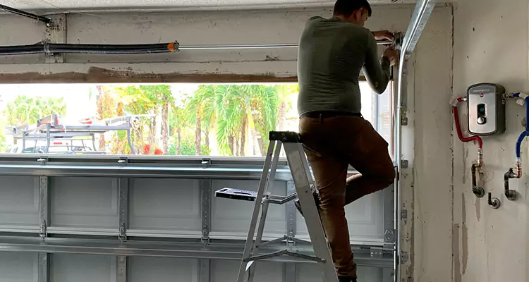 Garage Door Tension Spring Replacement in Ferry Pass, FL